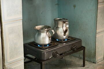 Image showing Making coffe on an old stove