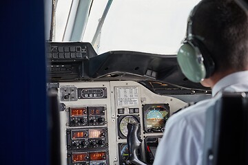 Image showing Controlling a small aircraft in the flight deck