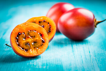 Image showing Fresh tamarillo fruit on wooden background