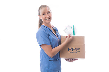 Image showing Nurse holding a delivered box of much needed N95 medical masks