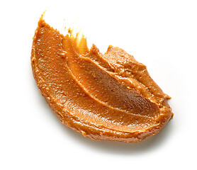 Image showing soft caramel on white background