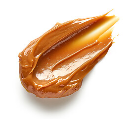 Image showing soft caramel on white background