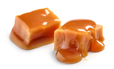 Image showing caramel pieces on white background