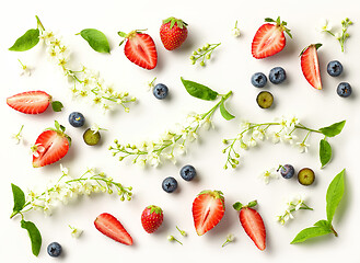 Image showing blooming bird cherry and fresh berries