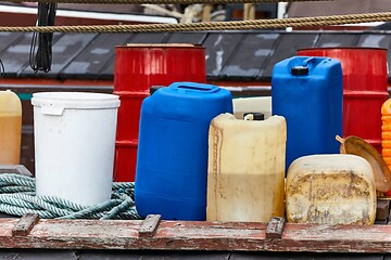 Image showing Plastic cans of chemicals