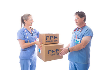 Image showing Doctors and nurses receiving a delivery of medical equipment PPE