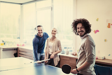 Image showing startup business team playing ping pong tennis