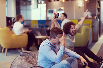 Image showing startup Office Workers Playing computer games