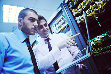 Image showing it engineers in network server room