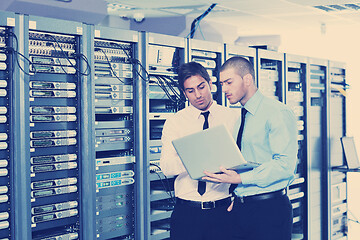 Image showing it enineers in network server room