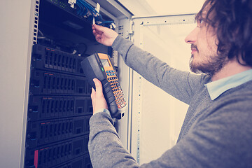 Image showing technician using digital cable analyzer