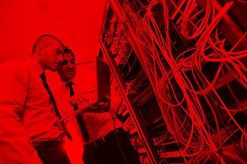 Image showing it engineers in network server room