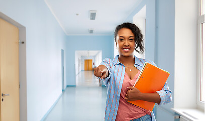 Image showing african american student woman with notebooks