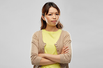 Image showing displeased asian woman with crossed arms