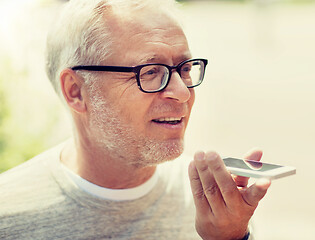 Image showing old man using voice command recorder on smartphone