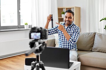 Image showing male video blogger with smart watch videoblogging