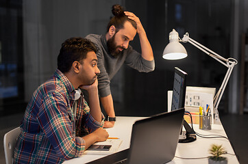 Image showing creative team with computer working late at office