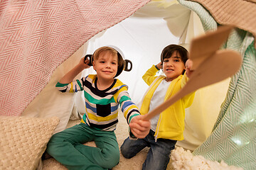 Image showing boys with pots playing in kids tent at home