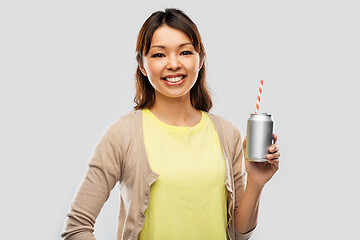 Image showing happy asian woman with can drink