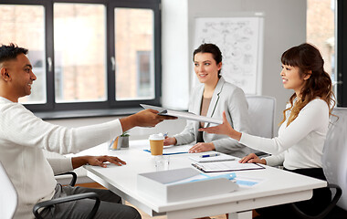 Image showing recruiters having job interview with male employee