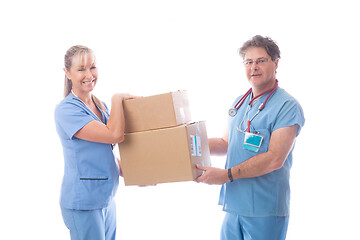 Image showing Medical healthcare workers holding a delivery of PPE or equipmen