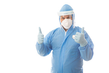 Image showing Healthcare or industrial worker in protective hazmat suit thumbs