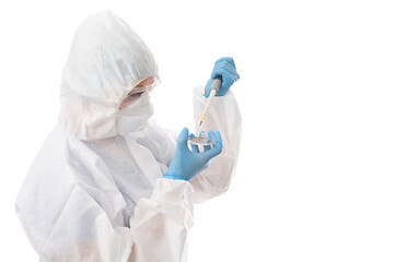 Image showing Scientist working in a lab, cure coronavirus, clinical studies