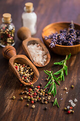 Image showing Salt, pepper with rosamary and lavender on wooden background