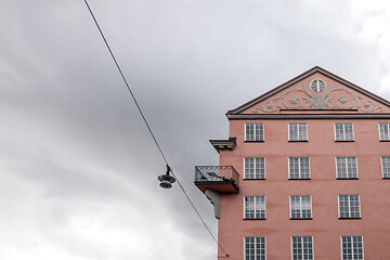 Image showing Beautiful pink building and streetlight