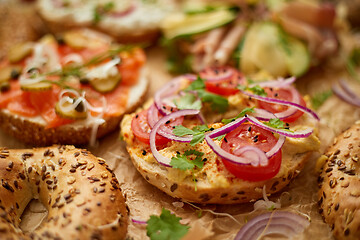 Image showing Composition of various homemade bagels sandwiches with sesame and poppy seeds