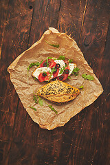 Image showing Healthy food concept. Sandwiches with hummus, mozarella, tomato, black olives