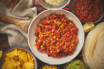 Image showing Preparing vegetable burritos on white pan. With various ingredinets for mexican food