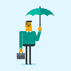 Image showing Caucasian insurance agent standing under umbrella.