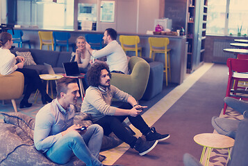 Image showing startup Office Workers Playing computer games