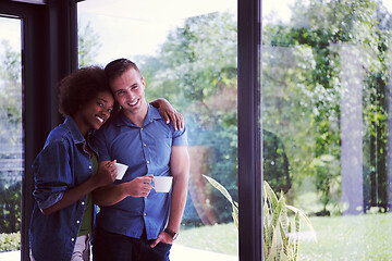 Image showing romantic happy young couple relax at modern home indoors