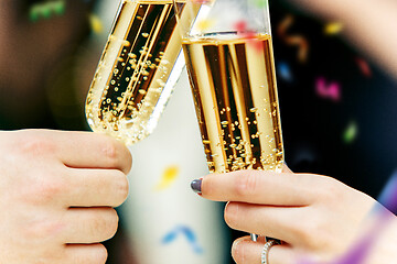 Image showing Celebration. Hands holding the glasses of champagne and wine making a toast.