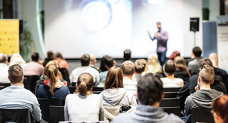 Image showing Business speaker giving a talk at business conference event.