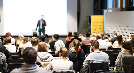 Image showing Business speaker giving a talk at business conference event.