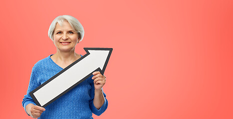 Image showing smiling senior woman with big rightwards arrow