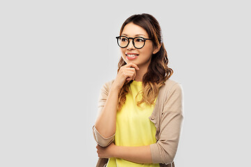 Image showing happy asian woman in glasses or student