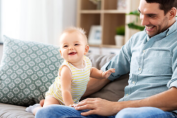 Image showing father with little baby daughter at home