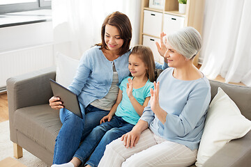 Image showing mother, daughter and grandmother with tablet pc