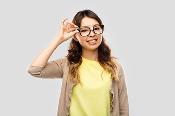 Image showing happy asian woman in glasses or student