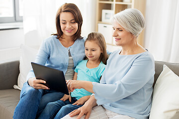 Image showing mother, daughter and grandmother with tablet pc