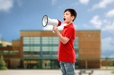 Image showing little boy in red polo shouting to megaphone