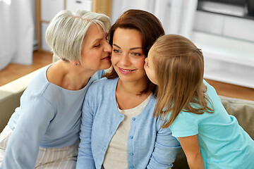 Image showing grandmother and daughter kissing happy mother