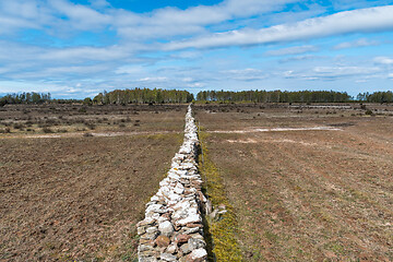 Image showing Straight dry stone wall boundry