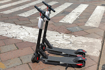 Image showing Electric Scooters at Street