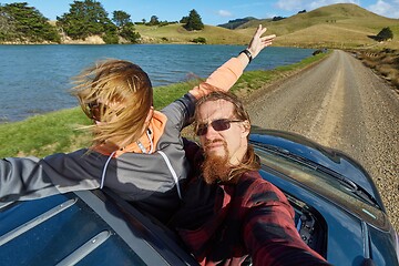 Image showing Car journey enjoying sunroof in the countryside