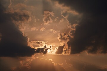 Image showing Sunset through cloudy dramatic sky